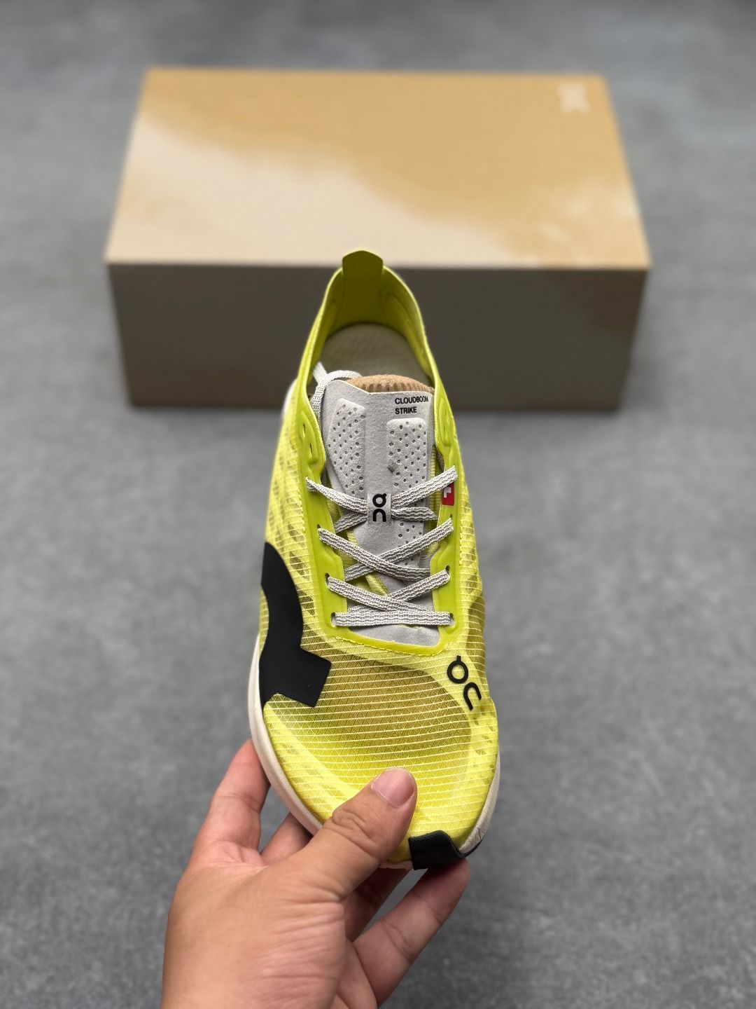 On Cloudboom Strike Limelight Sneakers