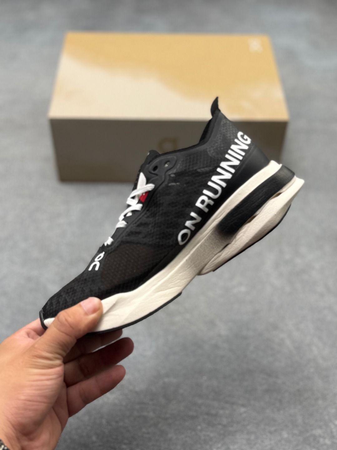 On Cloudboom Strike Black & White Sneakers