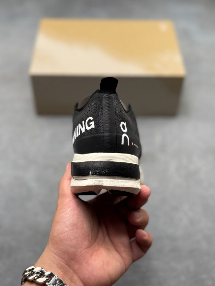 On Cloudboom Strike Black & White Sneakers