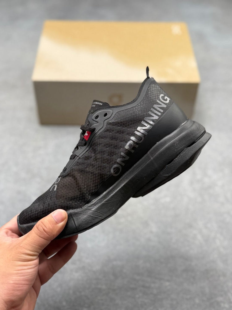 On Cloudboom Strike All-Black Sneakers
