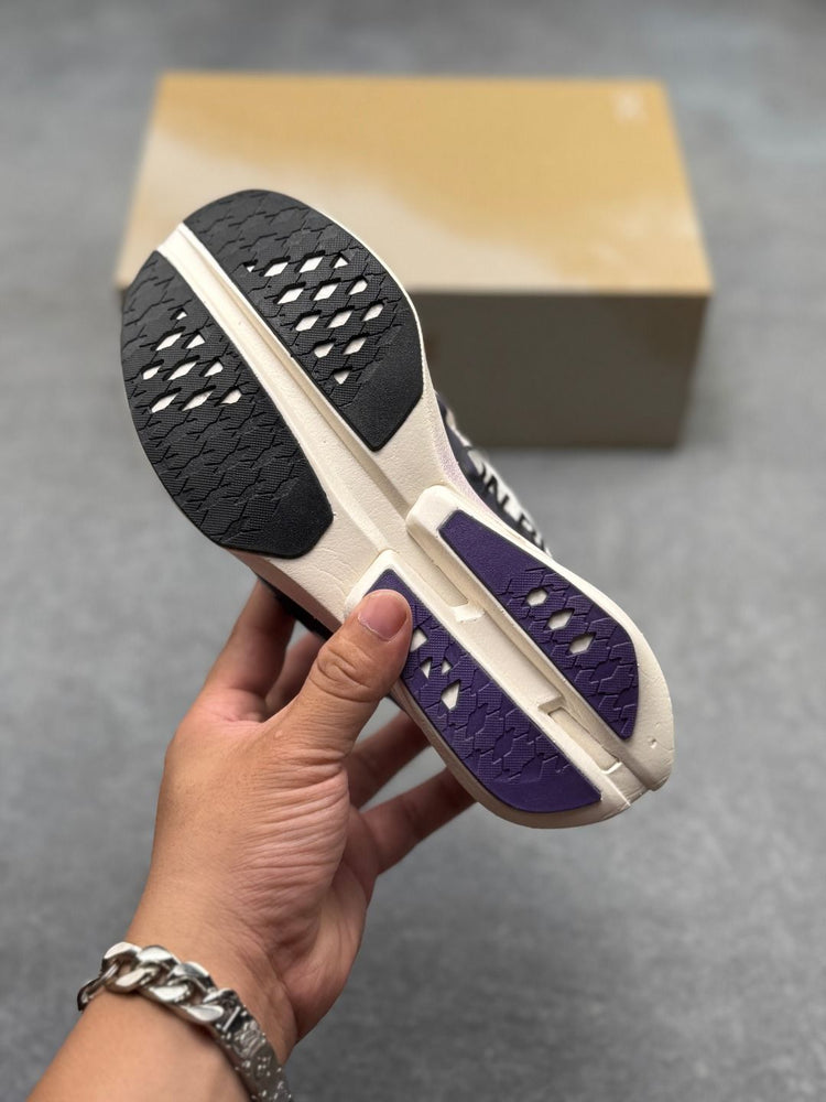 On Cloudboom Strike Black & Cream Sneakers