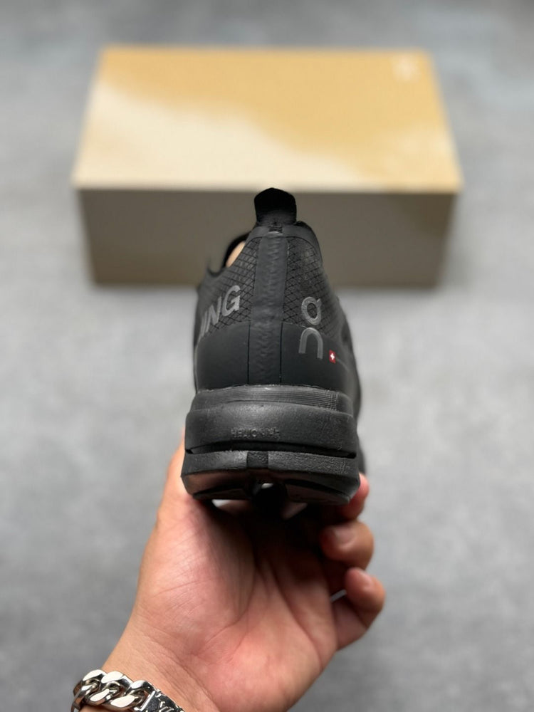 On Cloudboom Strike All-Black Sneakers