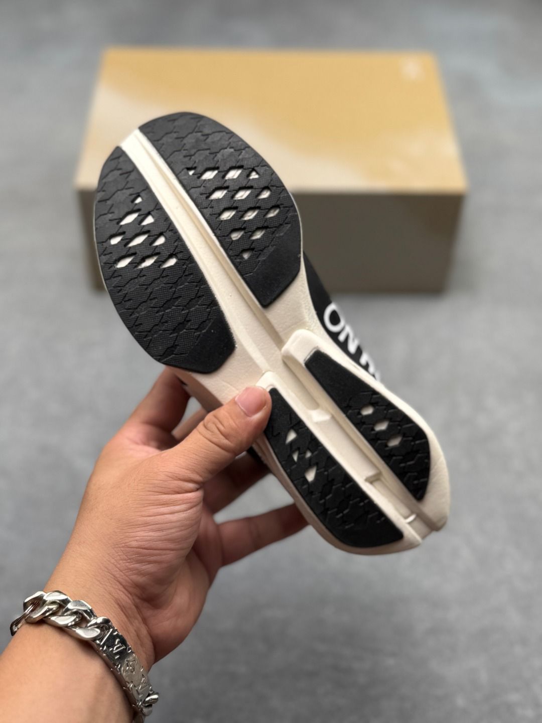 On Cloudboom Strike Black & White Sneakers