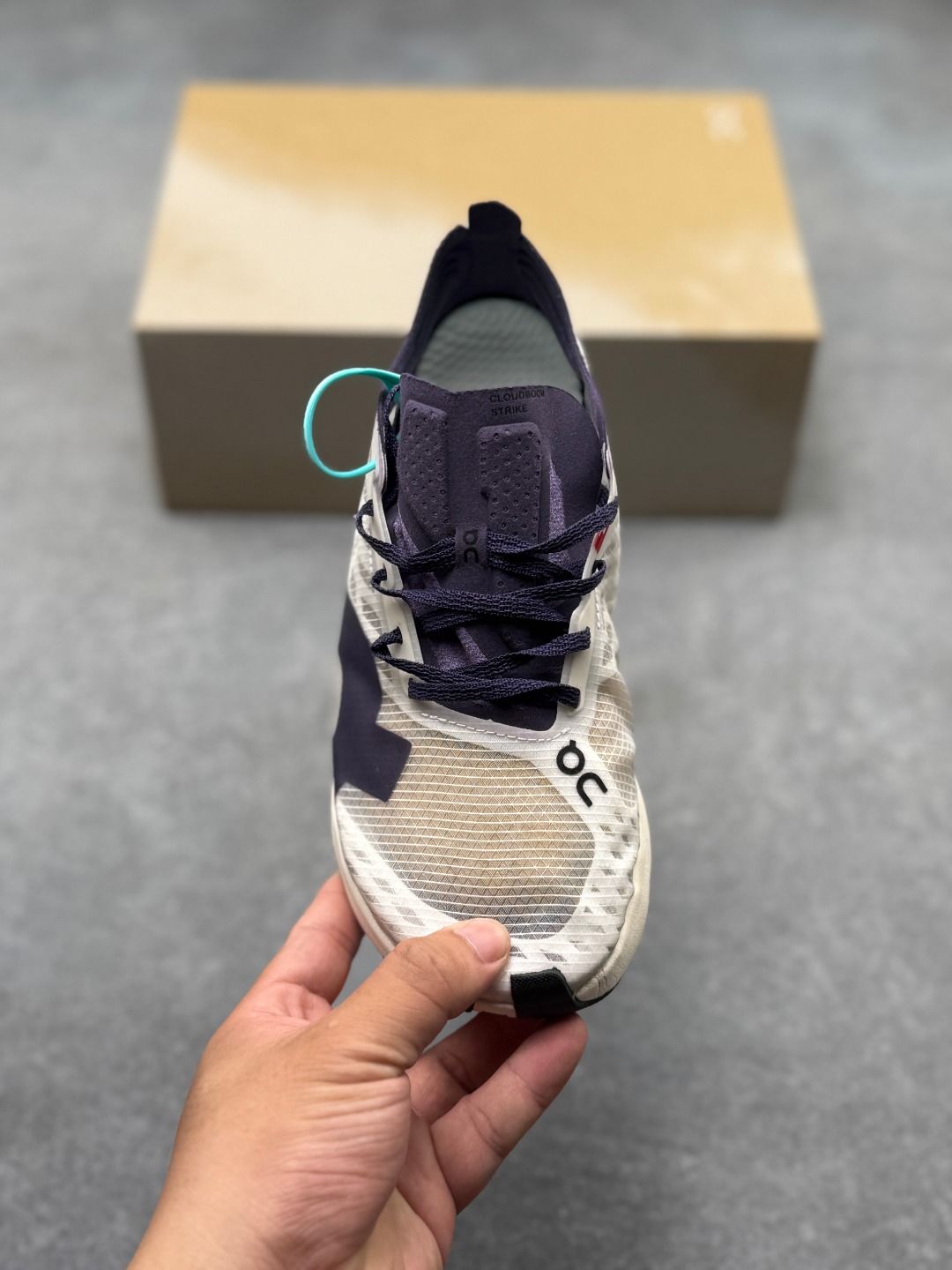On Cloudboom Strike Black & Cream Sneakers