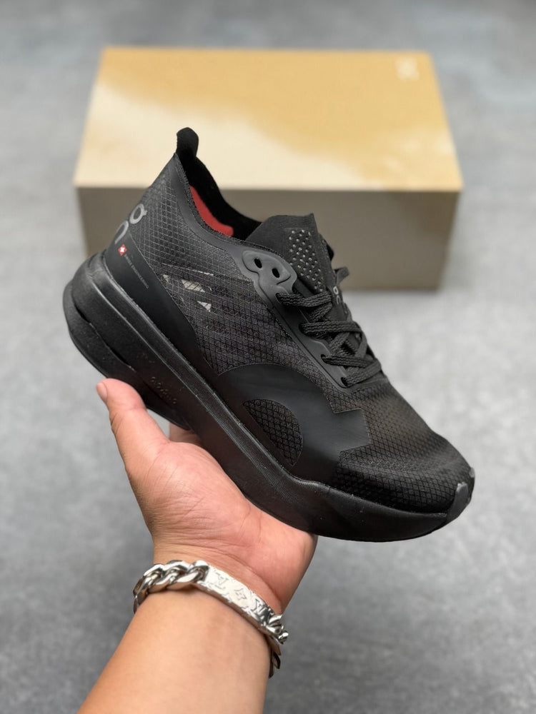 On Cloudboom Strike All-Black Sneakers