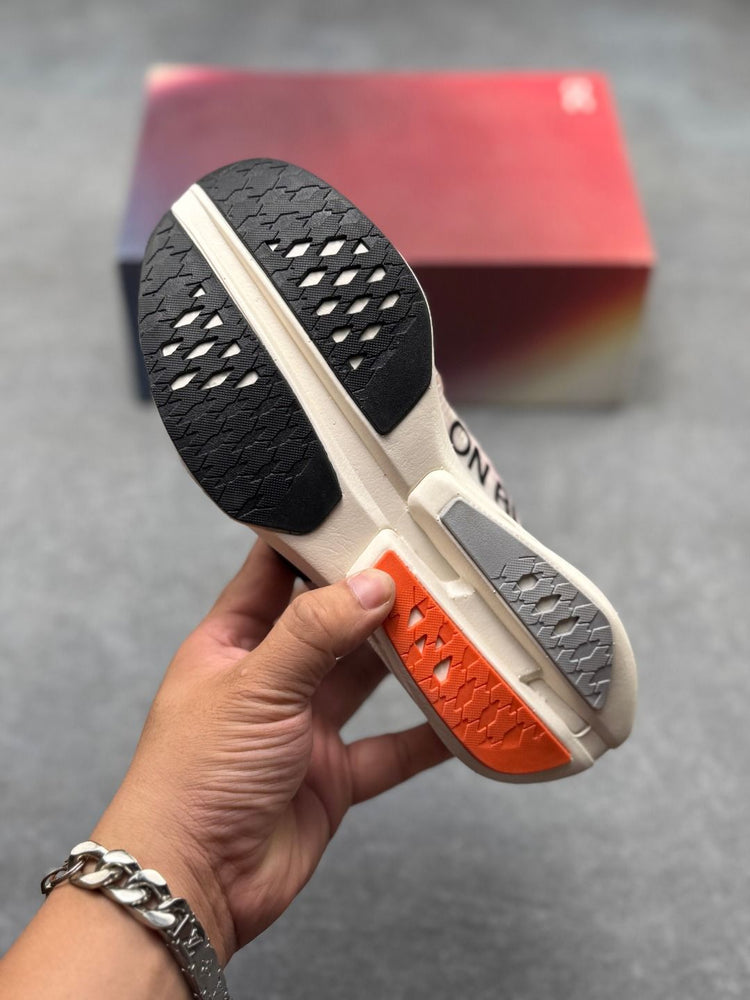 On Cloudboom Strike Pink & Orange Sneakers