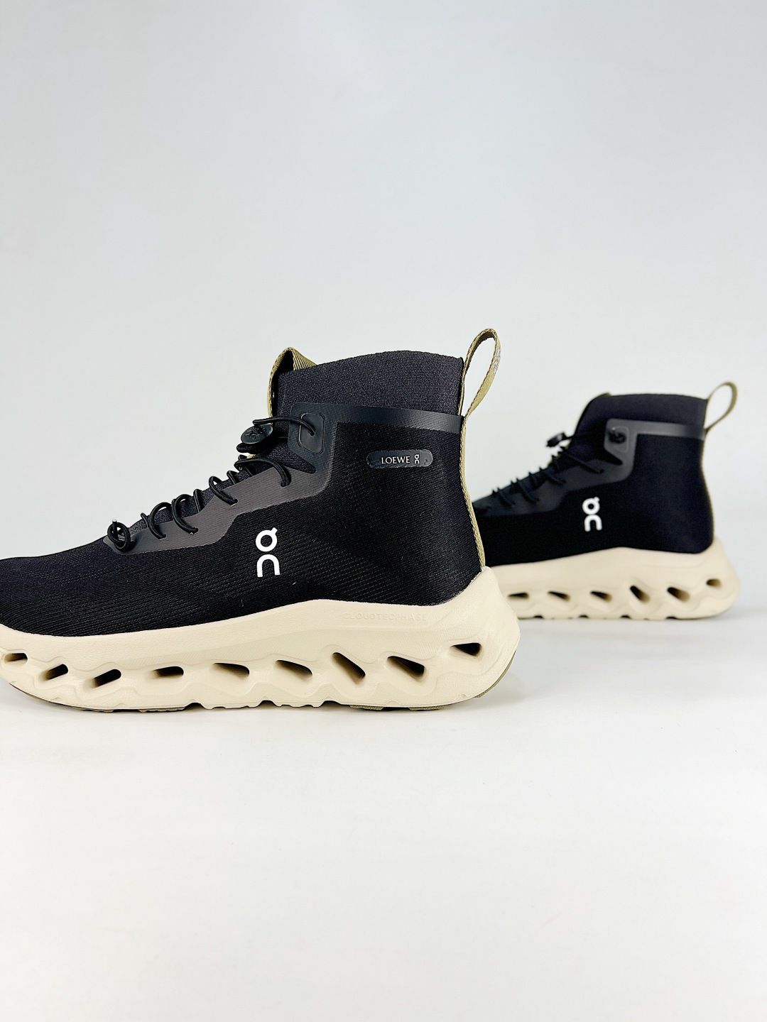 On Black & Ivory High-Top Sneakers