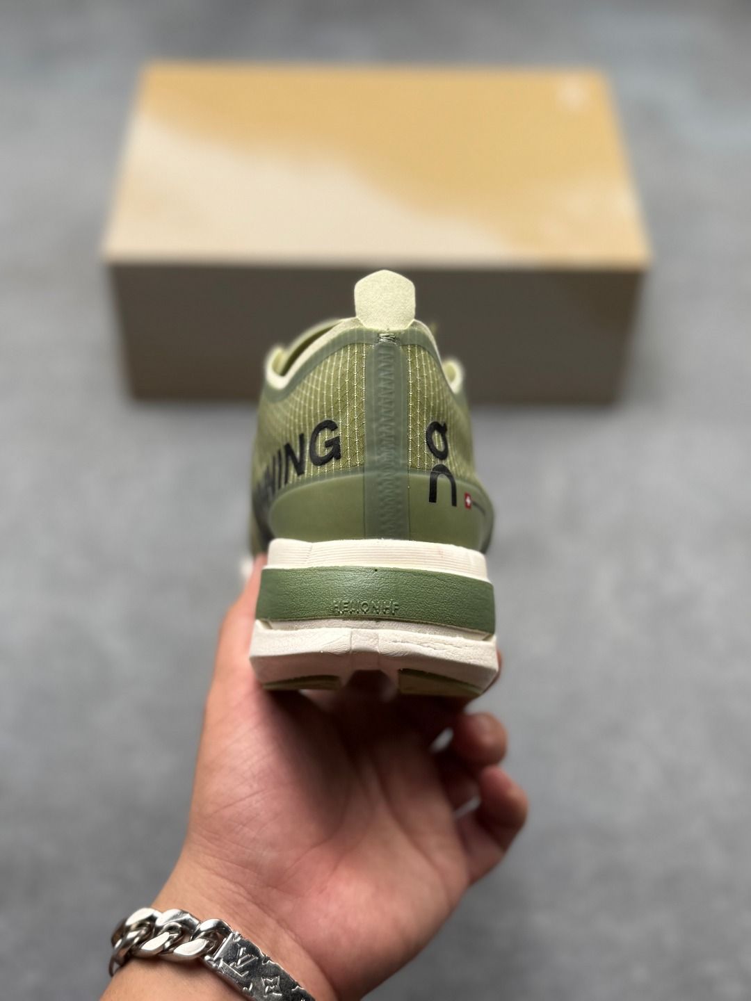 On Cloudboom Strike Olive & Cream Sneakers