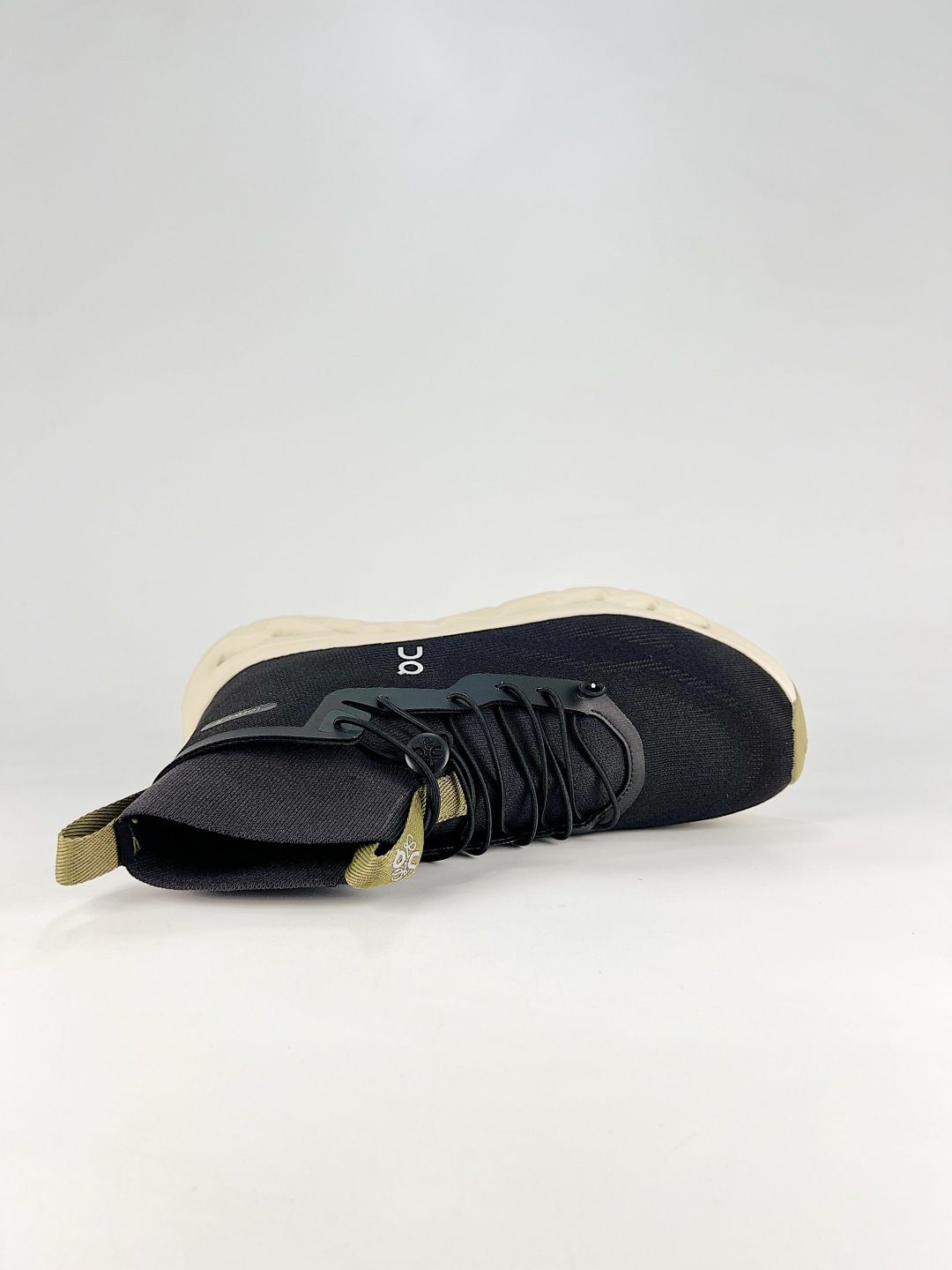 On Black & Ivory High-Top Sneakers