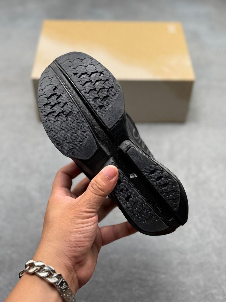 On Cloudboom Strike All-Black Sneakers