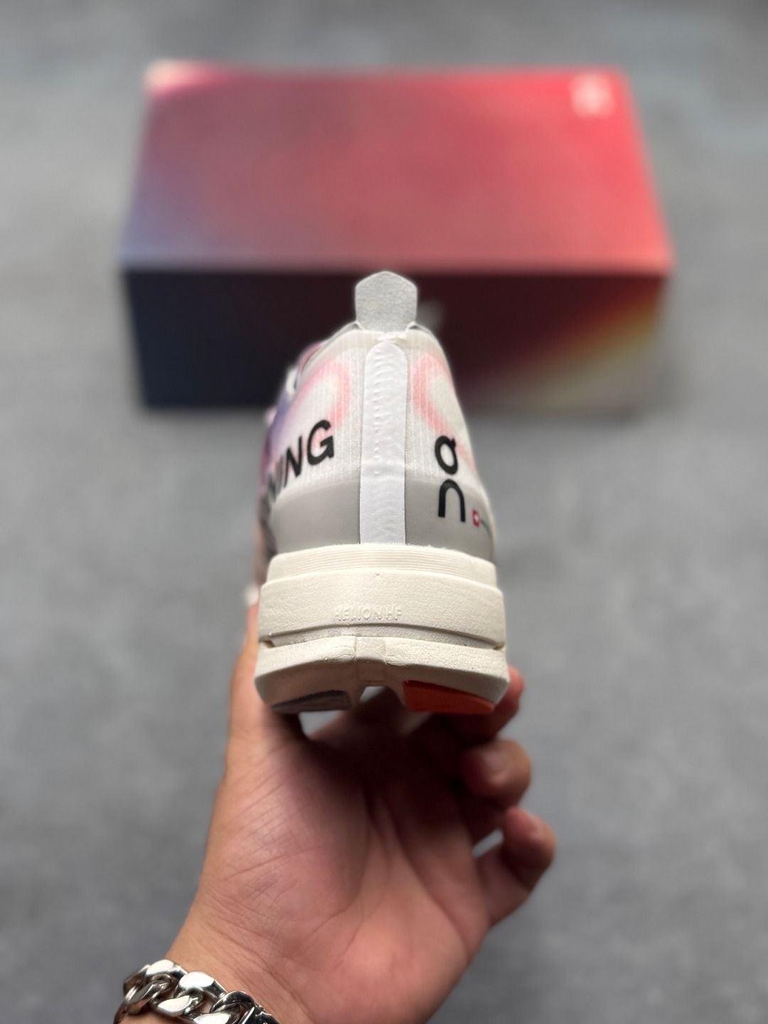 On Cloudboom Strike Pink & Orange Sneakers