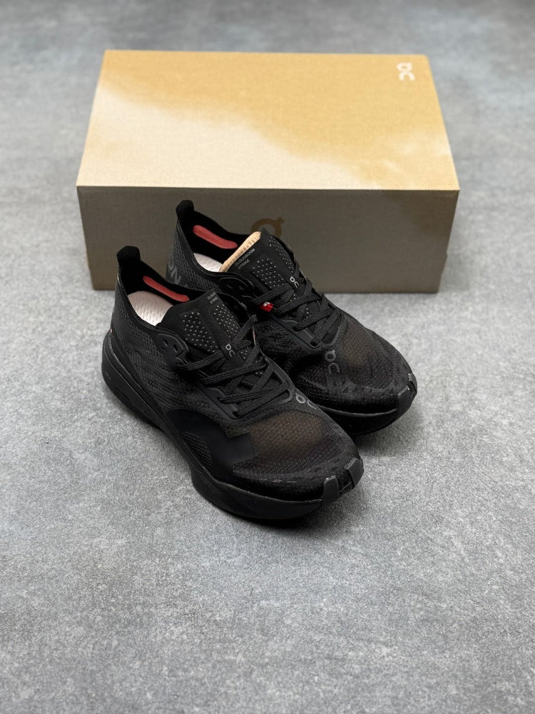 On Cloudboom Strike All-Black Sneakers