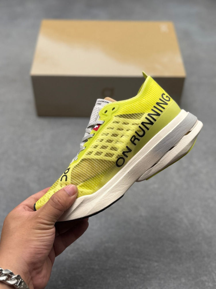 On Cloudboom Strike Limelight Sneakers