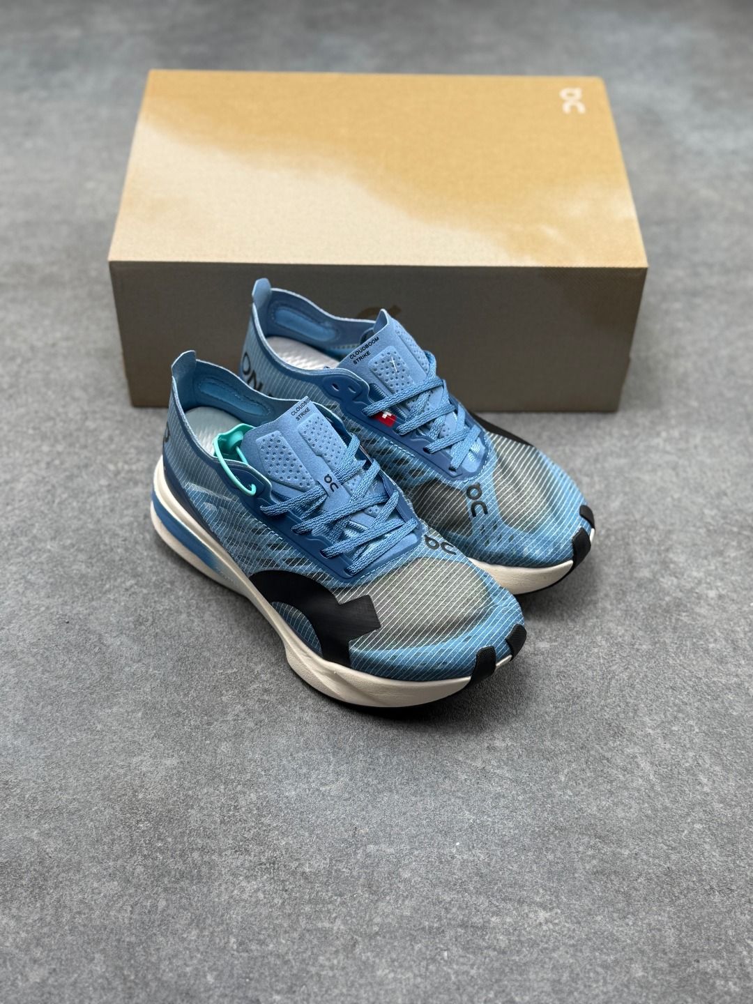 On Cloudboom Strike Blue & Cream Sneakers
