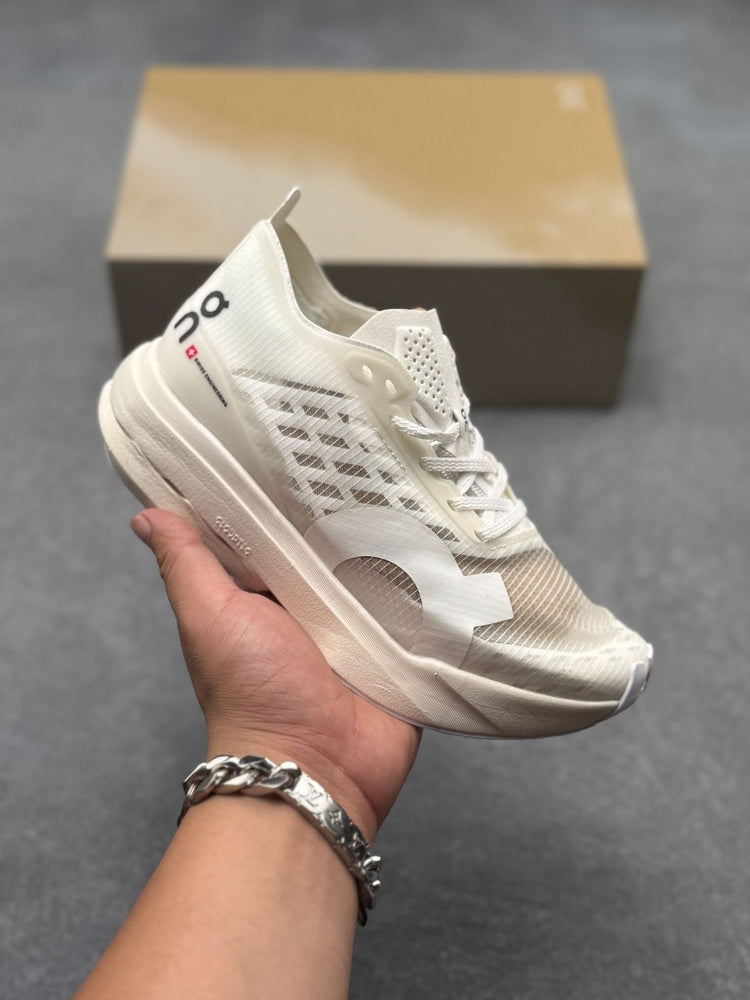 On Cloudboom Strike Cream Sneakers