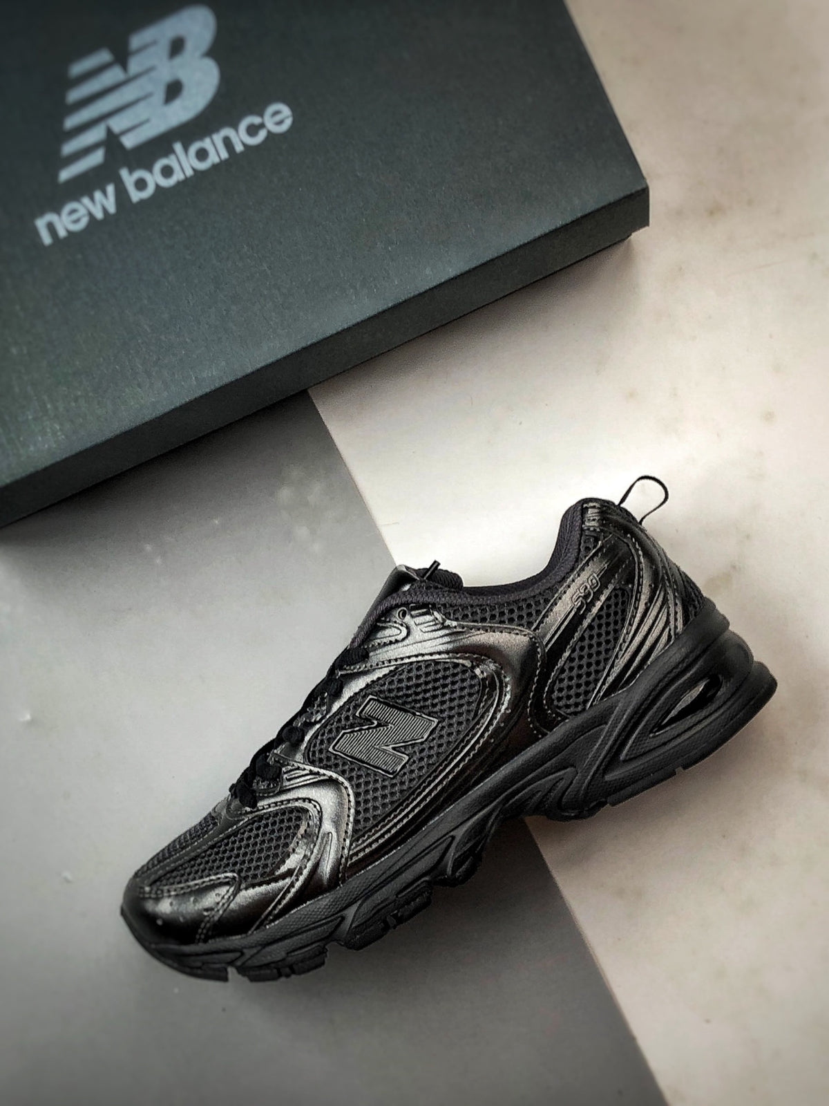 New Balance 530 Black & Silver Sneakers