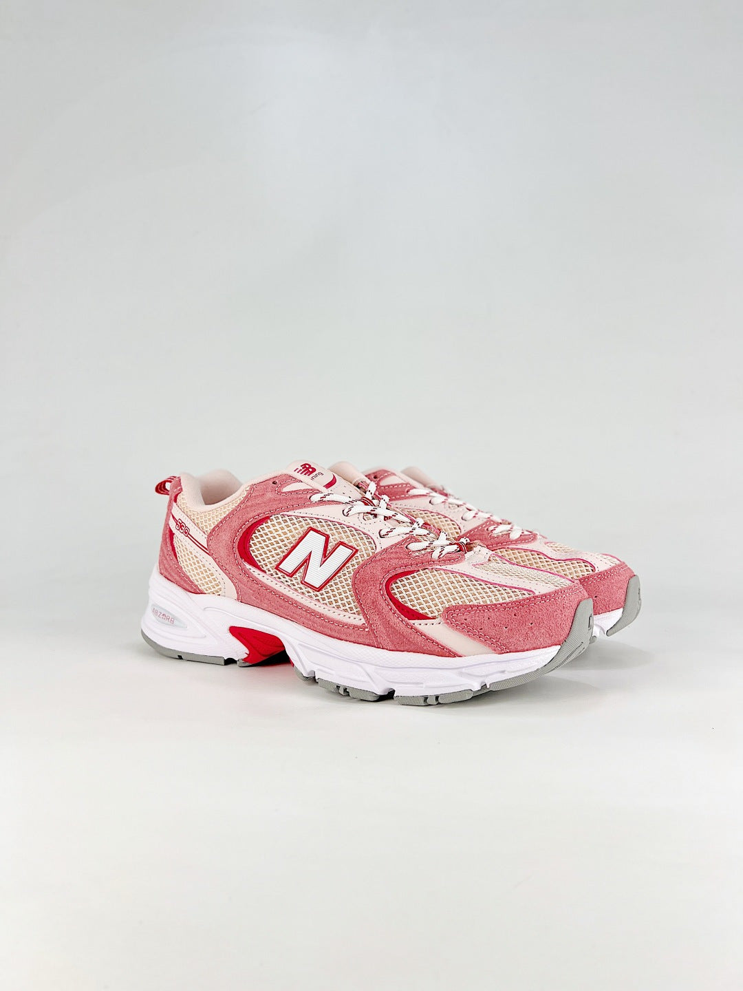 New Balance 530 Pink & White Sneakers