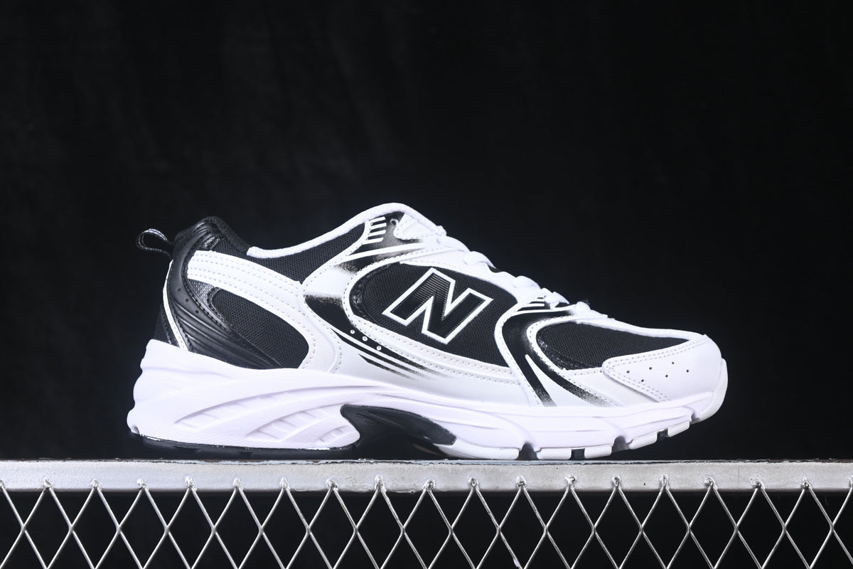 New Balance 530 Black & White Sneakers