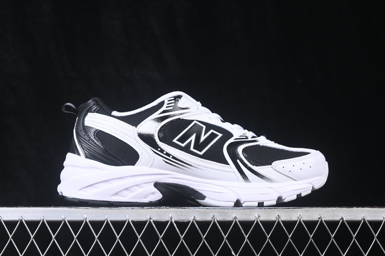 New Balance 530 Black & White Sneakers