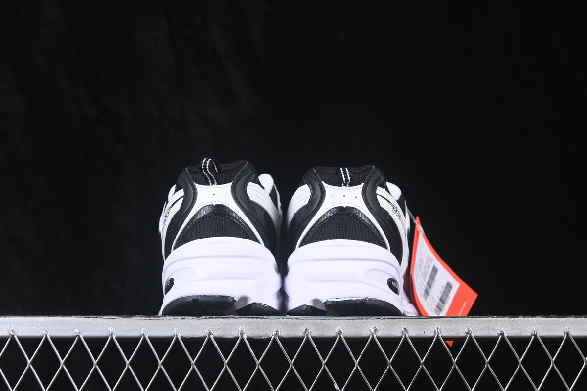 New Balance 530 Black & White Sneakers