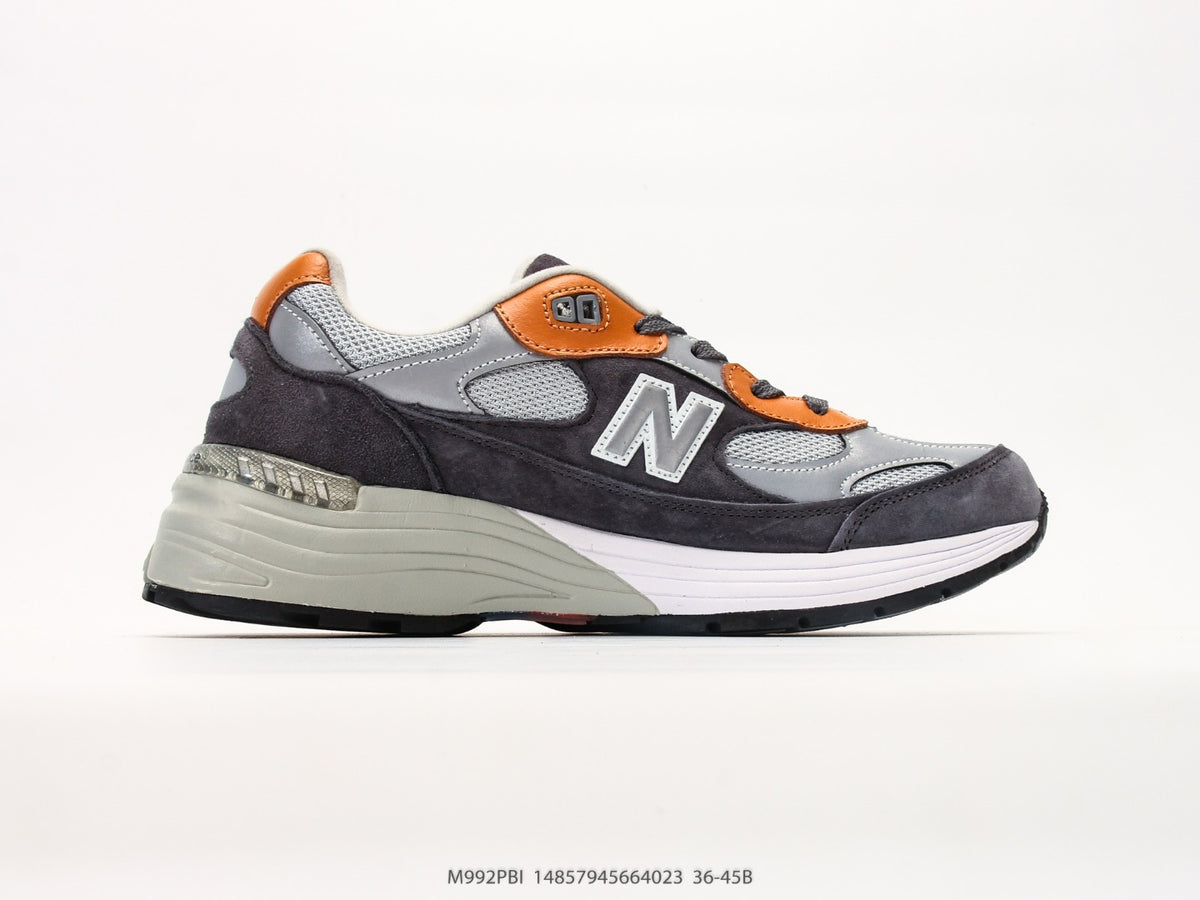 New Balance 992 in Grey, Black & Orange – Retro Running-Inspired Low-Top Sneakers for Casual Streetwear