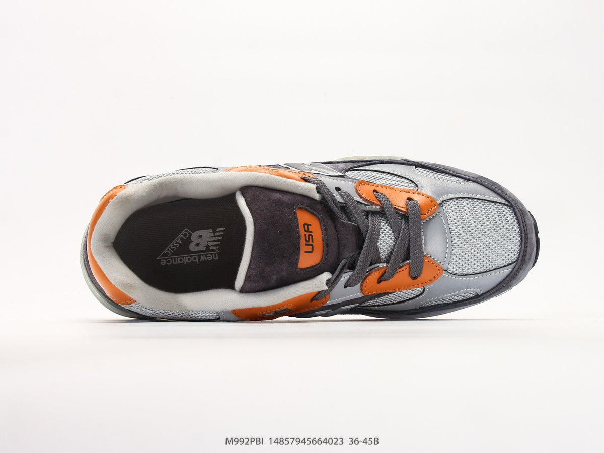 New Balance 992 in Grey, Black & Orange – Retro Running-Inspired Low-Top Sneakers for Casual Streetwear