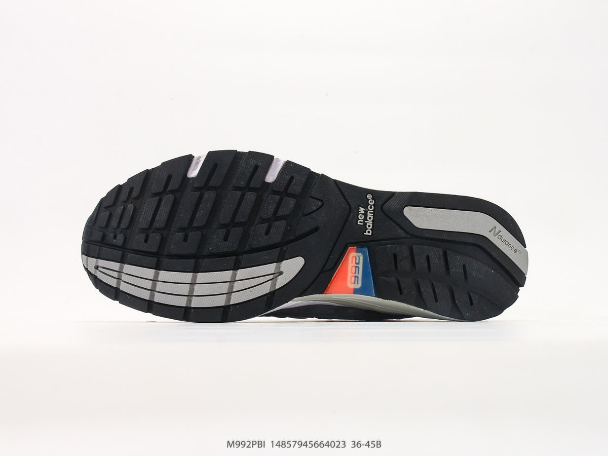 New Balance 992 in Grey, Black & Orange – Retro Running-Inspired Low-Top Sneakers for Casual Streetwear