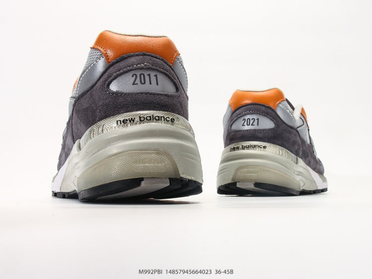 New Balance 992 in Grey, Black & Orange – Retro Running-Inspired Low-Top Sneakers for Casual Streetwear