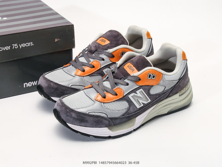 New Balance 992 in Grey, Black & Orange – Retro Running-Inspired Low-Top Sneakers for Casual Streetwear